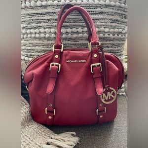 MK red leather hand bag